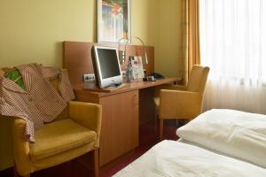 TV a/nebo společenská místnost v ubytování Hotel Mehl