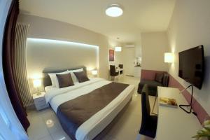 Łóżko lub łóżka w pokoju w obiekcie JessApart – Ochota Apartments