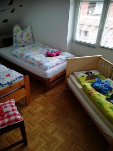 Postel nebo postele na pokoji v ubytování Ferienwohnung "Zur Biene"