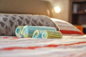 Postel nebo postele na pokoji v ubytování Le Note di Elisa + 5 fotografií