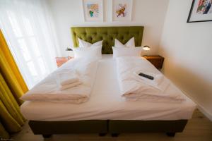 Postel nebo postele na pokoji v ubytování Hotel Luis Stadl