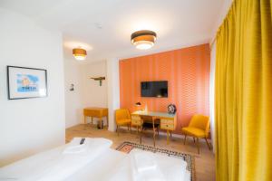 TV a/nebo společenská místnost v ubytování Hotel Luis Stadl
