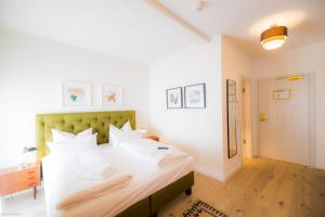 Postel nebo postele na pokoji v ubytování Hotel Luis Stadl