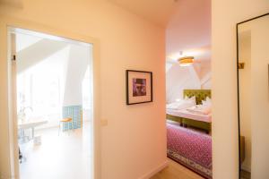 Postel nebo postele na pokoji v ubytování Hotel Luis Stadl