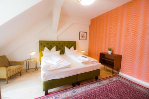 Postel nebo postele na pokoji v ubytování Hotel Luis Stadl