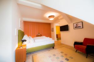 Cama ou camas em um quarto em Hotel Luis Stadl