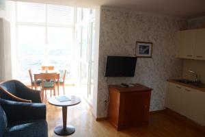 TV a/nebo společenská místnost v ubytování Hotel Tannerhof