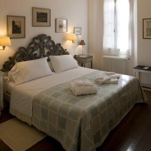 Кровать или кровати в номере M Club De Luxe B&B