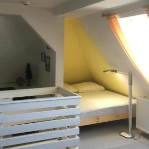 Ein Bett oder Betten in einem Zimmer der Unterkunft Ferienwohnung Harzsterne
