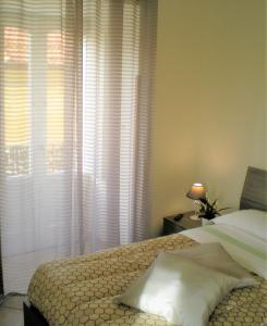 Postel nebo postele na pokoji v ubytování Itaca B&B