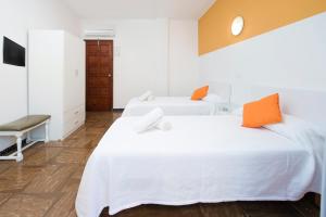 Cama o camas de una habitación en Hostal Alicante