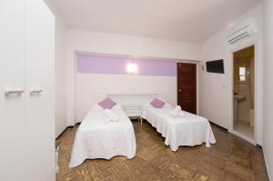 Cama o camas de una habitación en Hostal Alicante