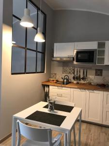 Kuchyňa alebo kuchynka v ubytovaní PAPALI loft + 21 fotografií