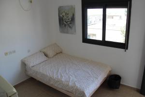 Katil atau katil-katil dalam bilik di Apartments With Sea View