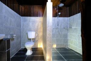 Koupelna v ubytování Melina Beach Resort
