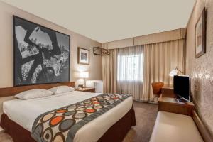 Letto o letti in una camera di Super 8 by Wyndham Duncan