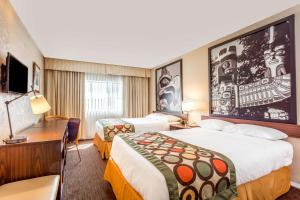 Letto o letti in una camera di Super 8 by Wyndham Duncan
