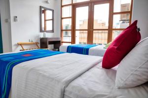 Letto o letti in una camera di C 1 Colombo Fort