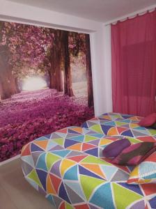 Cama o camas de una habitación en Apartamento primera línea de mar