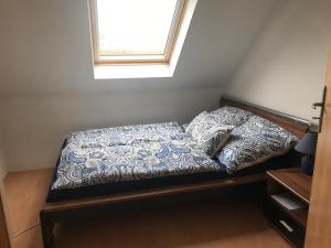 Katil atau katil-katil dalam bilik di Ferienwohnung am Komisenpad