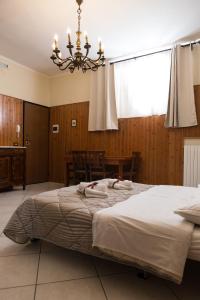 Un pat sau paturi într-o cameră la Il Giardinetto
