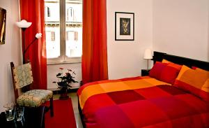 מיטה או מיטות בחדר ב-Vatican Paradise
