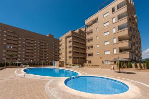 Bazén v ubytování Apartamentos Jardines del Mar II nebo v jeho okolí