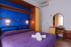 Кровать или кровати в номере Hotel Viking