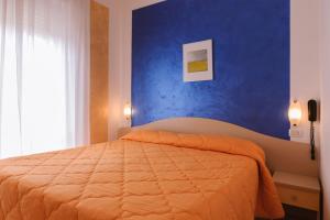 Кровать или кровати в номере Hotel Viking