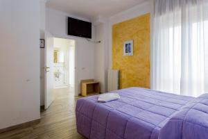 Кровать или кровати в номере Hotel Viking