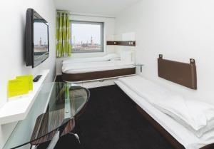 Katil atau katil-katil dalam bilik di Wakeup Copenhagen - Carsten Niebuhrs Gade
