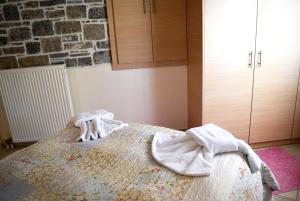 Posteľ alebo postele v izbe v ubytovaní Cozy Residences in the center of Volissos Village - Lydia Lithos- + 37 fotografií