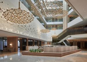 The lobby or reception area at Mysk Al Mouj Hotel