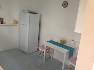 Kuchyň nebo kuchyňský kout v ubytování Casa Sunshine