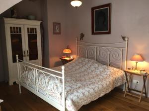 Ένα ή περισσότερα κρεβάτια σε δωμάτιο στο Ferienhaus Vulkaneifel Landhaus Loogh