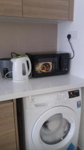 Kuchyň nebo kuchyňský kout v ubytování Tasneem Guesthouse + 5 fotografií