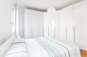 A bed or beds in a room at Bella Vita Charming House