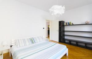 A bed or beds in a room at Bella Vita Charming House