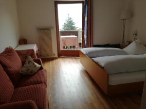 Кровать или кровати в номере Berggütl