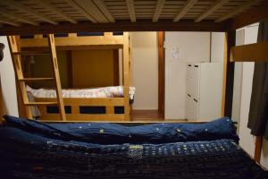 Postel nebo postele na pokoji v ubytování Guest house SHIE SHIMI