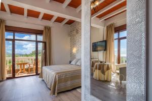 Кровать или кровати в номере Dulce Nombre Hotel - Apartamentos