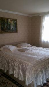 Ένα ή περισσότερα κρεβάτια σε δωμάτιο στο House Rustaveli street 112
