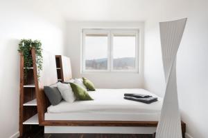 Posteľ alebo postele v izbe v ubytovaní Halna Residence
