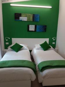 Letto o letti in una camera di Suite Color Verona