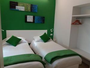 Letto o letti in una camera di Suite Color Verona