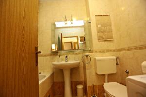 Kúpeľňa v ubytovaní Apartman Lucita