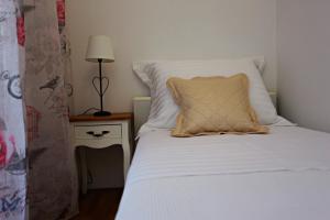 Posteľ alebo postele v izbe v ubytovaní Apartman Lucita