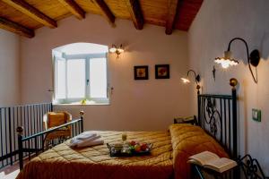 Giường trong phòng chung tại Agriturismo Villa Gaia