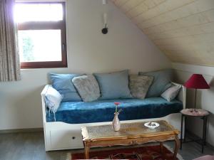 Posezení v ubytování B&B De Hostelier
