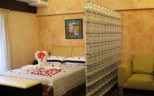 Abalon Pompei Resort客房内的一张或多张床位